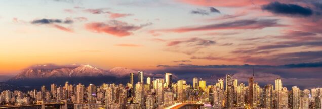 The Vancouver skyline with the mountains in the background.