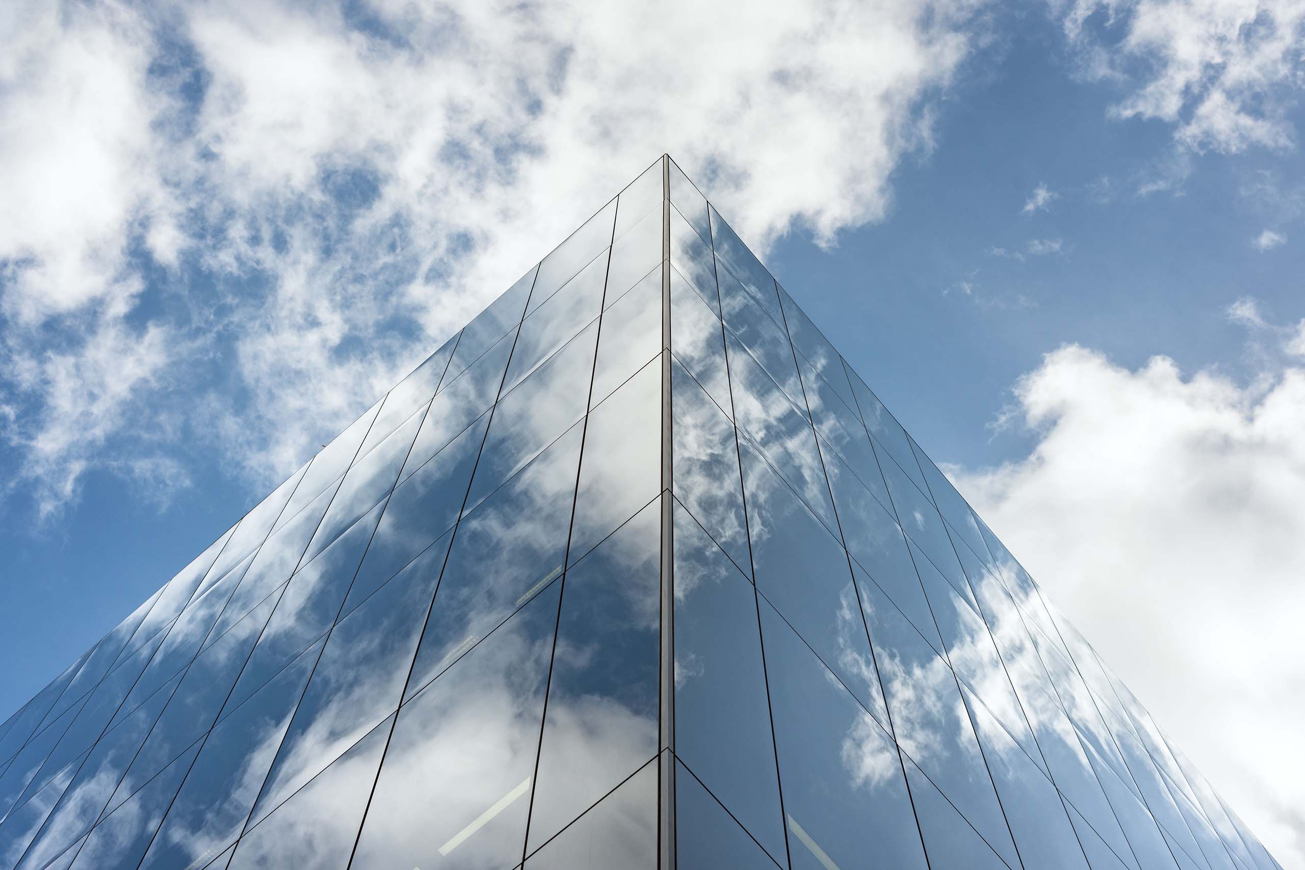 Skyscraper reflecting sky and clouds