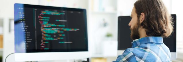 A man working at a computer.